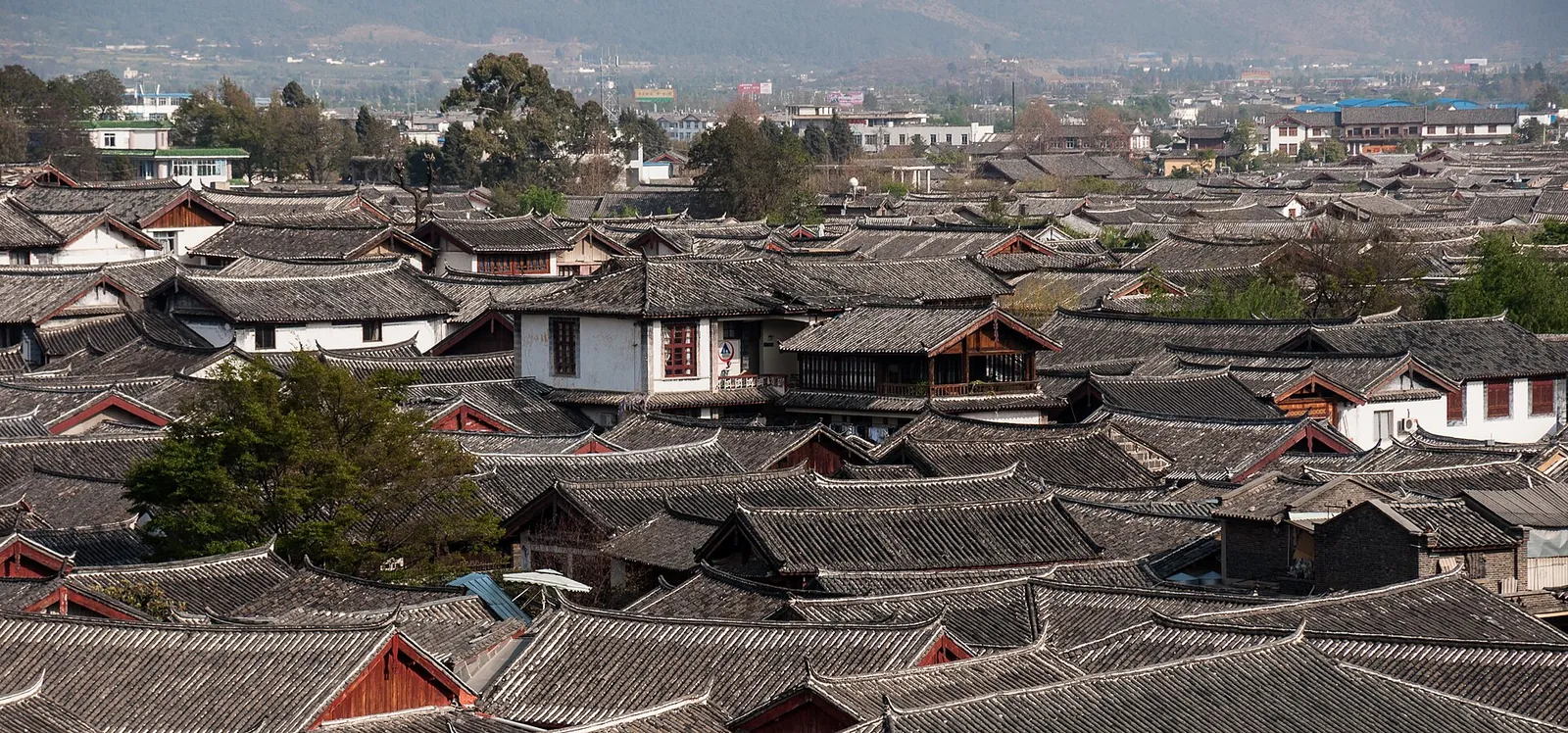 Tiled roofs of the old town of Lijiang, Yunnan, where Banyan Tree Private Collection listed villas